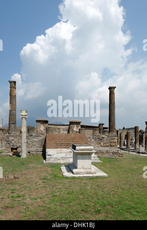 The Temple of Apollo, believed to be the oldest structure found at Pompeii, Italy. Mount Vesuvius can be seen in the background. Stock Photo