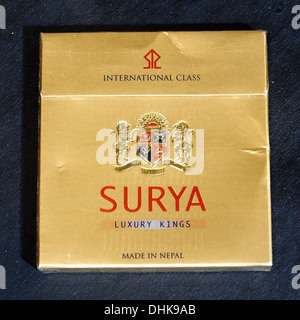 Surya International Class cigarettes are produced in Nepal and are known  for their luxury branding. The cigarettes come in a distinct package and  cater to premium market segments Stock Photo
