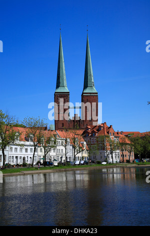 Historic waterfront at river Trave with cathedral, Hanseatic town Lubeck, Schleswig-Holstein, Germany Stock Photo