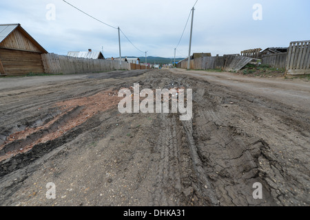 A Russian Dirt Road in the town of Khuzir. A small town on Olkhon Island, in Lake Baikal, Russia. Stock Photo