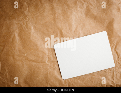Brown craft paper with a blank tag on a white background Stock Photo