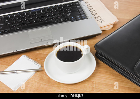 Cup from coffee on the laptop Stock Photo