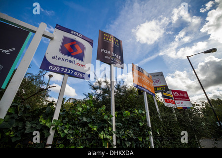 Estate agents boards advertising sales or rentals seen in south east London, UK. Stock Photo