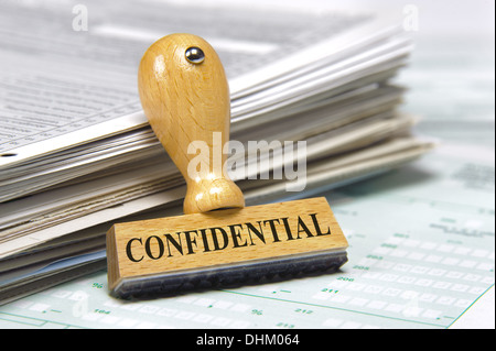 stamp marked with confidential on documents Stock Photo