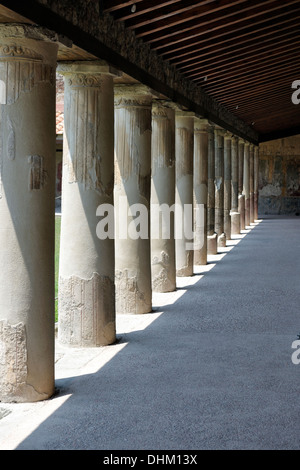 Part view of the large open air peristyle of the Stabian Baths, Pompeii Italy. The Baths are the largest, best preserved and old Stock Photo