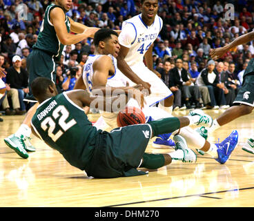 Chicago, ILLINOIS, USA. 12th Nov, 2013. Kentucky Wildcats guard Andrew Harrison (5) collided with Michigan State Spartans guard/forward Branden Dawson (22) and lost the ball as Michigan State defeated #1 Kentucky 78-74 on Tuesday November 12, 2013 in Chicago, IL. Photos by Mark Cornelison | Staff © Lexington Herald-Leader/ZUMAPRESS.com/Alamy Live News Stock Photo