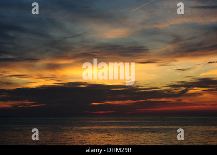 Beautiful dramatic beautiful color sunset over lake Stock Photo