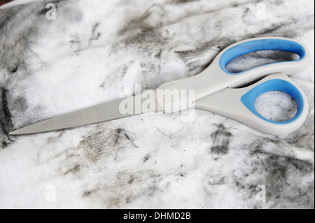 Dirty lying tools on white with dirtied grease Stock Photo