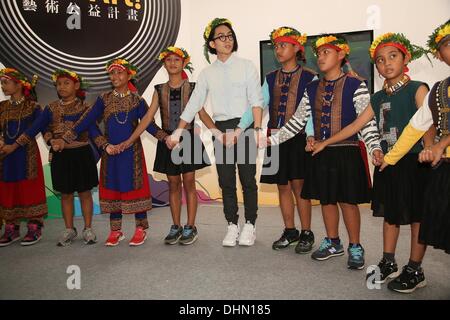 Singer Yoga Lin attends Taipei International Art Exhibition in Taipei, Taiwan on Saturday November 9,2013. Stock Photo