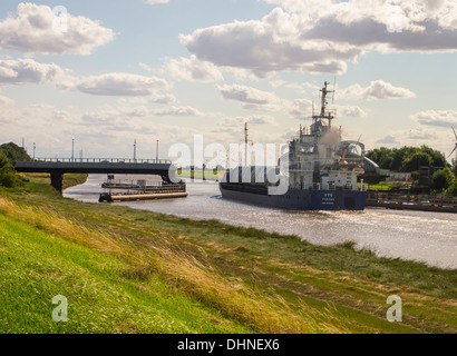 V Y G Panama cargo ship carrying timber passing sutton bridge on the river nene lincolnshire Stock Photo