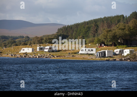 Loch Naver, Scotland. Picturesque view of Altnaharra Caravan Site on the edge of Loch Naver. Stock Photo