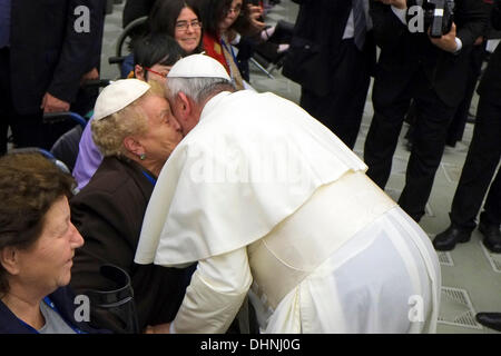 Rome, Italy. 9th November 2013. Pope Francis jokes with a lady who gave her a skullcap during the meeting UNITALSI( Italian National Union for Transporting the Sick to Lourdes and International Shrines )  9 November  2013 © Realy Easy Star/Alamy Live News Stock Photo