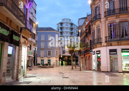 Square in Malaga at dusk. Andalusia, Spain Stock Photo