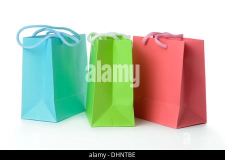 Red, green and blue gift bags isolated on white background Stock Photo