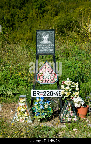 A wayside shrine devoted to a young man killed in a road accident in Crna Gora. Stock Photo