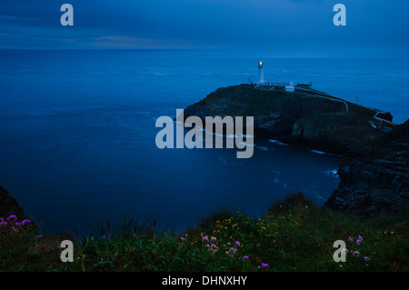 The lighthouse at South Stack at dusk. Anglesey, Wales. May. Stock Photo