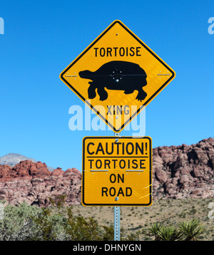 Tortoise crossing sign along the 13-mile scenic drive at Red Rock Canyon National Conservation Area close to Las Vegas Stock Photo