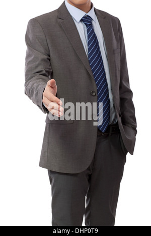 Business man extending a hand to shake Stock Photo