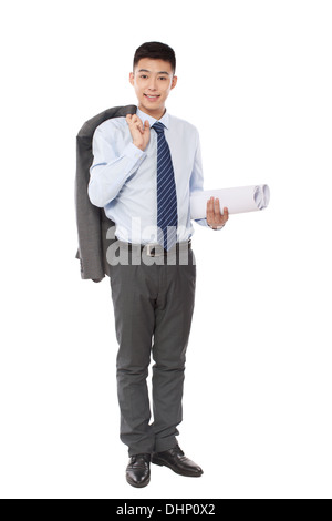 Young engineer holding blueprints Stock Photo