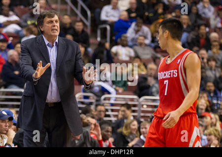 November 13, 2013: Houston Rockets head coach Kevin McHale talks with point guard Jeremy Lin (7) during the NBA game between the Houston Rockets and the Philadelphia 76ers at the Wells Fargo Center in Philadelphia, Pennsylvania. The 76ers win 123-117 in overtime. (Christopher Szagola/Cal Sport Media) Stock Photo