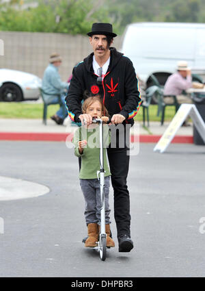 Anthony Kiedis of The Red Hot Chilli Peppers takes a ride on a scooter with his son, Everly Bear Kiedis at Malibu Farmer's Market  Malibu, California - 13.05.12 Stock Photo