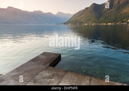 Old concrete pier in Perast town. Kotor Bay, Adriatic Sea, Montenegro Stock Photo