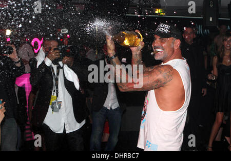 Christian Audigier sprays Champagne during his birthday