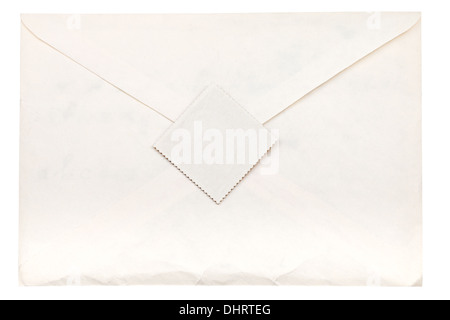 closed paper envelope sealed by postage stamp isolated on white background Stock Photo