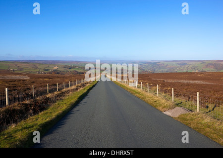 English Autumn landscape with a view of Nidderdale from the tarmac road through the moors above Pateley bridge in Yorkshire Stock Photo