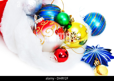 Santa's Christmas cap with multi-colored toys Stock Photo