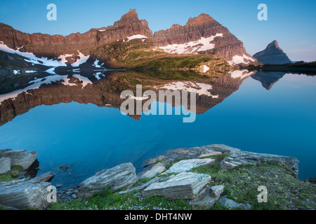 Cathedral Peak reflected in Sue Lake, Glacier National Park, Montana. Stock Photo