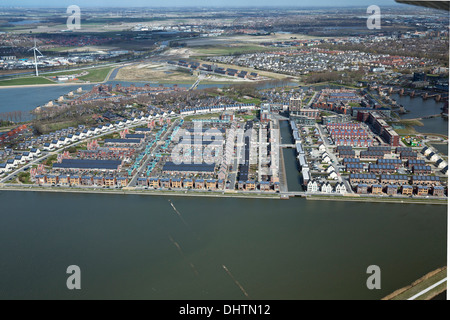 Netherlands, Heerhugowaard, District called City of the Sun, Dutch: Stad van de Zon. All houses with solar panels. Aerial Stock Photo