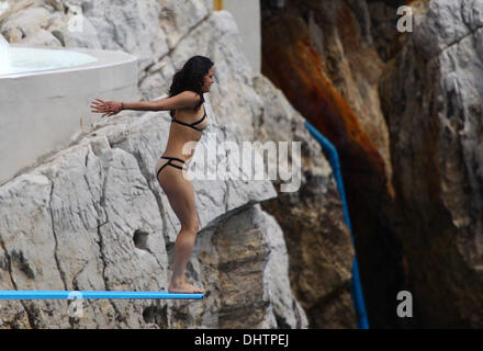 Michelle Rodriguez seen swimming in the sea at Eden Roc hotel during the 65th annual Cannes Film Festival. Antibes, France - 23.05.2012 Stock Photo