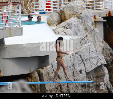 Michelle Rodriguez seen swimming in the sea at Eden Roc hotel during the 65th annual Cannes Film Festival. Antibes, France - 23.05.2012 Stock Photo