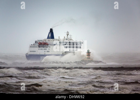 Netherlands, IJmuiden, DFDS ferry arrives from Newcastle during heavy stoL on North Sea Stock Photo