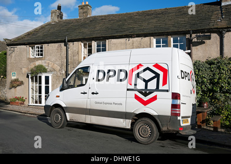 DPD delivery delivering van vehicle courier parked outside cottage house Burnsall village North Yorkshire England UK United Kingdom GB Great Britain Stock Photo
