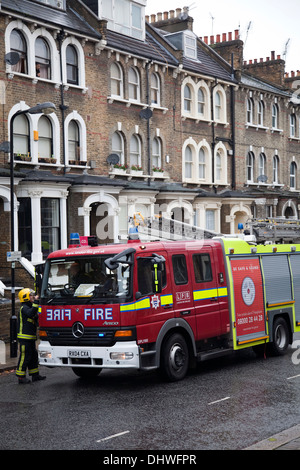 Fire Engines Attending Situation on Residential street in South London - UK Stock Photo