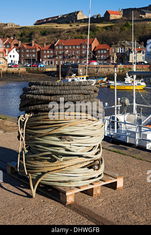 Stack pile of ropes and floats fishing equipment on the quayside Whitby harbour port North Yorkshire England UK United Kingdom GB Great Britain Stock Photo