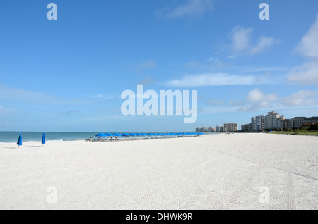 Row of beach chairs on Marco Island Beach by the Hilton Hotel, Marco Island, Florida Stock Photo