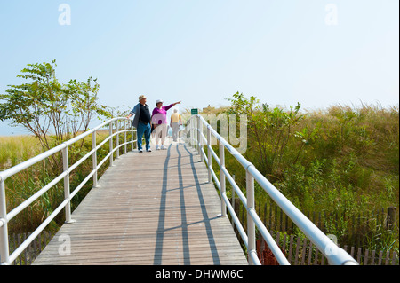 USA America New Jersey NJ N.J. Atlantic City people use a beach walk to cross over protected dunes Stock Photo
