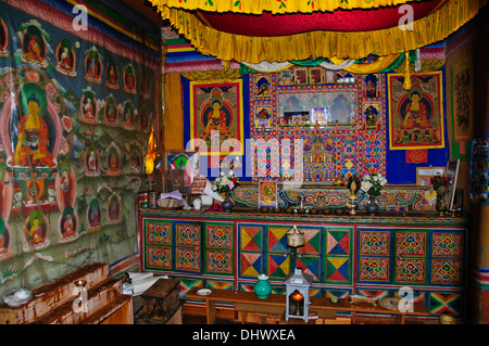 Buddhist prayer room incorporated into a Farm house,where animals live on the ground floor,inhabitants on the second,Paro,Bhutan Stock Photo