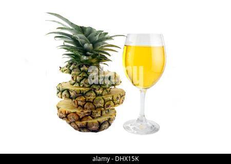 Picture pineapple slices stacked and Pineapple juice in glass on white background. Stock Photo