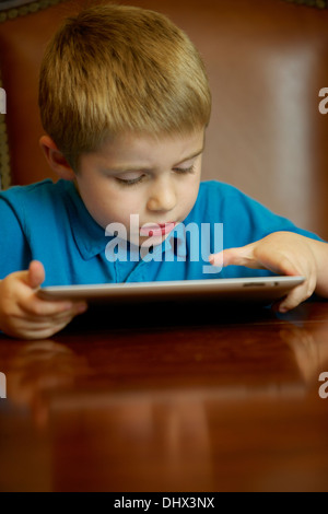 Kids using technology Stock Photo