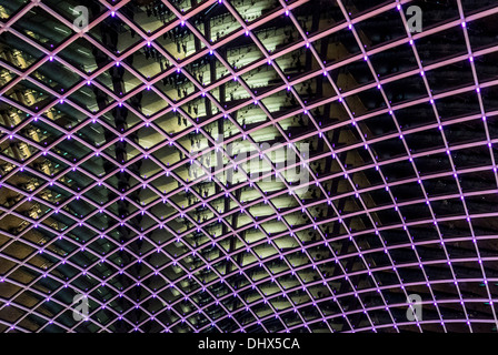 Domed roof structure at Leeds Trinity Shopping Centre, seen from inside at night. Leeds, UK. Stock Photo