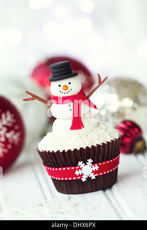 Snowman cupcake Stock Photo