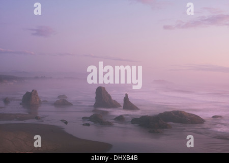 Sea stacks along Bandon Beach after sunset, Bandon Beach State Park, Oregon. Stock Photo