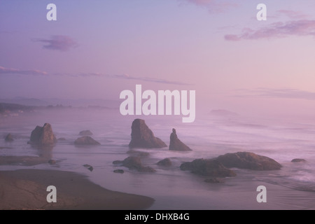 Sea stacks along Bandon Beach after sunset, Bandon Beach State Park, Oregon. Stock Photo