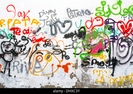 colorful graffiti on a white wall Stock Photo