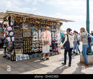 The sights of Venice Venezia Veneto region, northeastern Italy, Europe. Market stall, street seller selling souvenirs Stock Photo