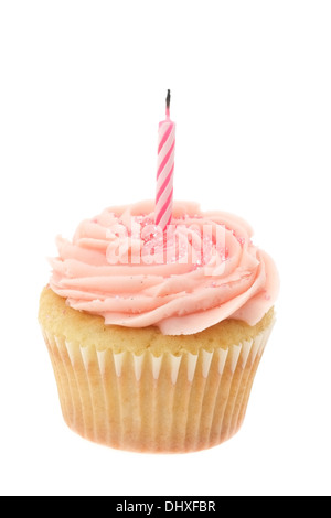 Pink buttercream iced cupcake with a single birthday candle - studio shot with a white background Stock Photo